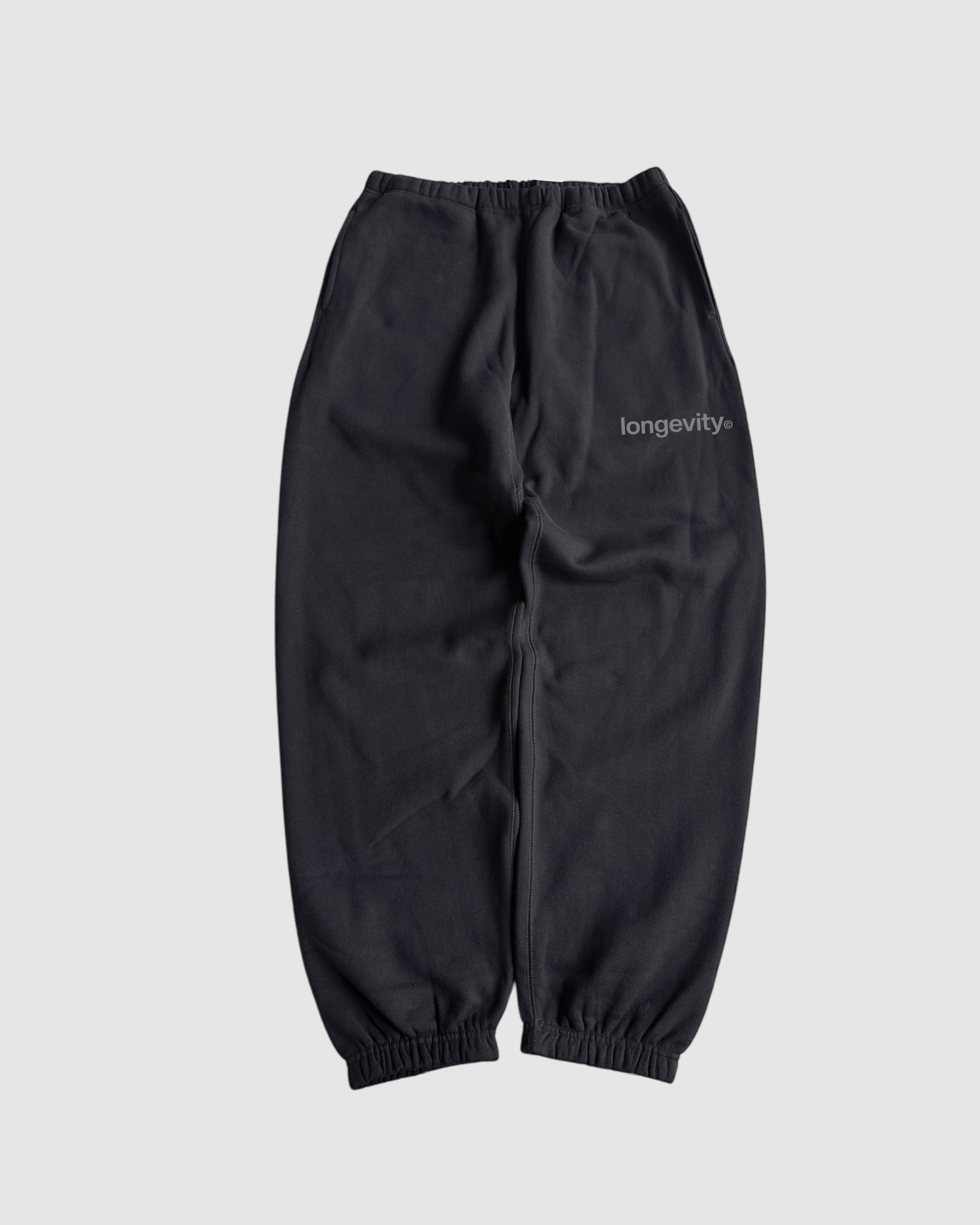 word logo_cuffed bottom running sweats (black)